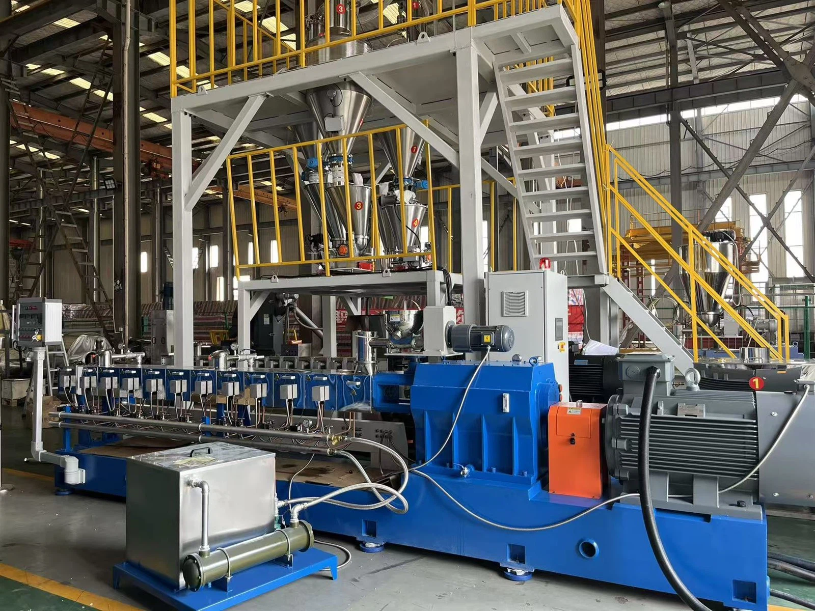 twin screw extruder with loss-in-weight feeder.jpg
